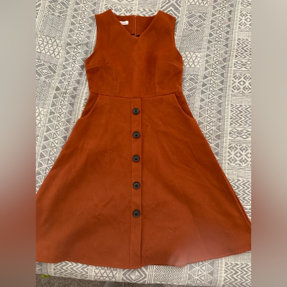 Size large, velvet satin texture, never worn, deep pockets.